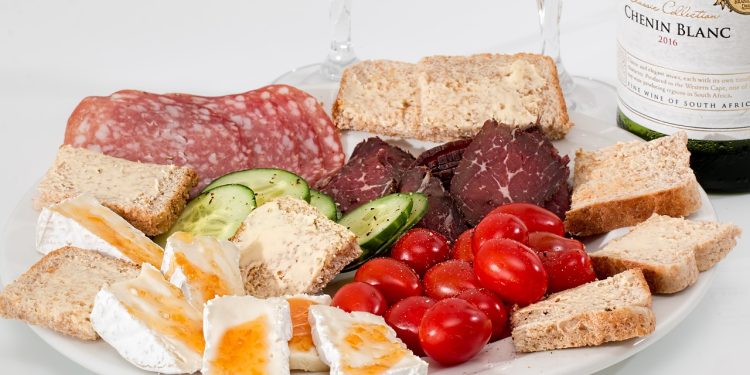 hors d'oeuvre, starters, appetizers, charcuterie, delicatessen, food platter, catering, cheese, salami, smoked beef, tomato, snack, bread, plate, cuisine, protein, antipasto, meat, tasty, platter, assortment, appetite, finger food, buffet, canapes, nourishment, nutrition, protein, protein, protein, protein, protein