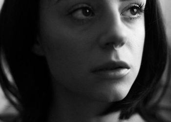 grayscale photo of womans face